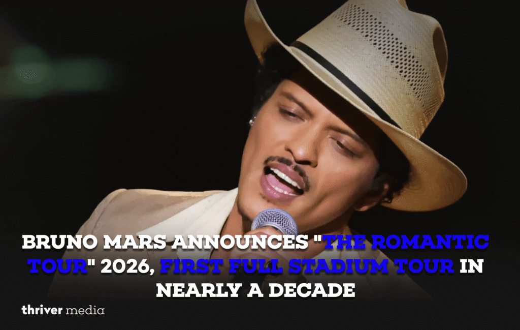 Bruno Mars performing on stage with dazzling lights and a cheering crowd during his 2026 Romantic Tour announcement.