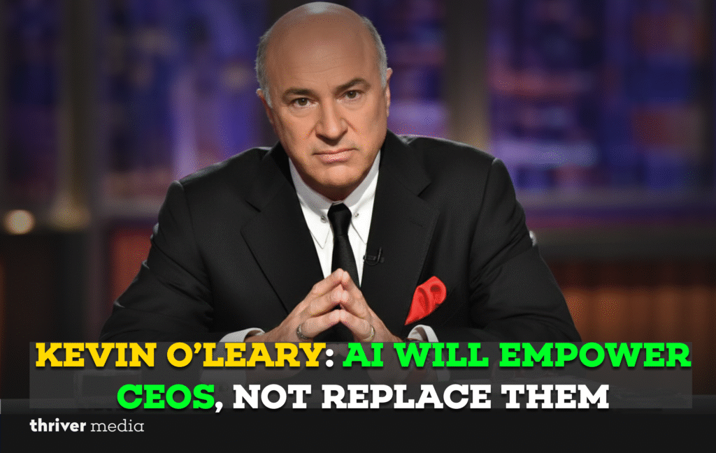 Current image: Kevin O’Leary seated in a studio, hands clasped, wearing a black suit and red pocket square, discussing how AI will empower CEOs rather than replace them.