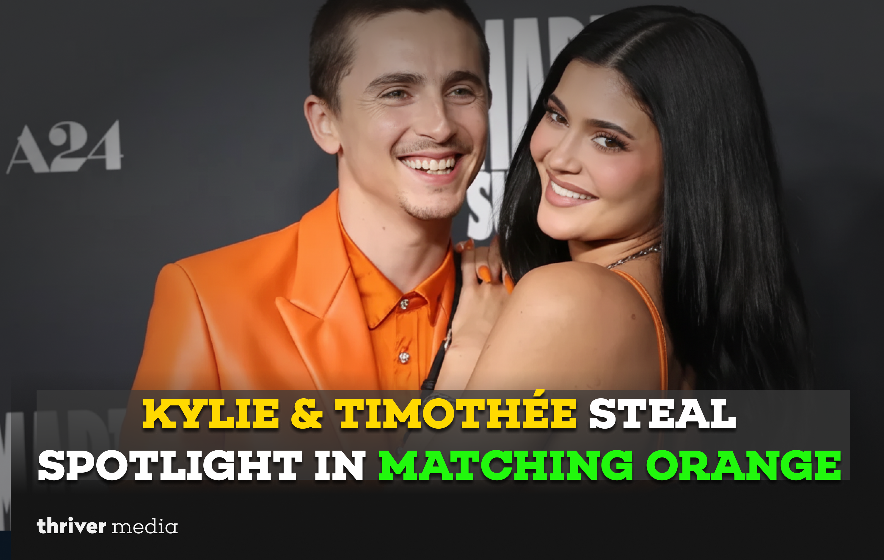 Kylie Jenner and Timothée Chalamet wearing matching orange outfits at the Marty Supreme LA premiere