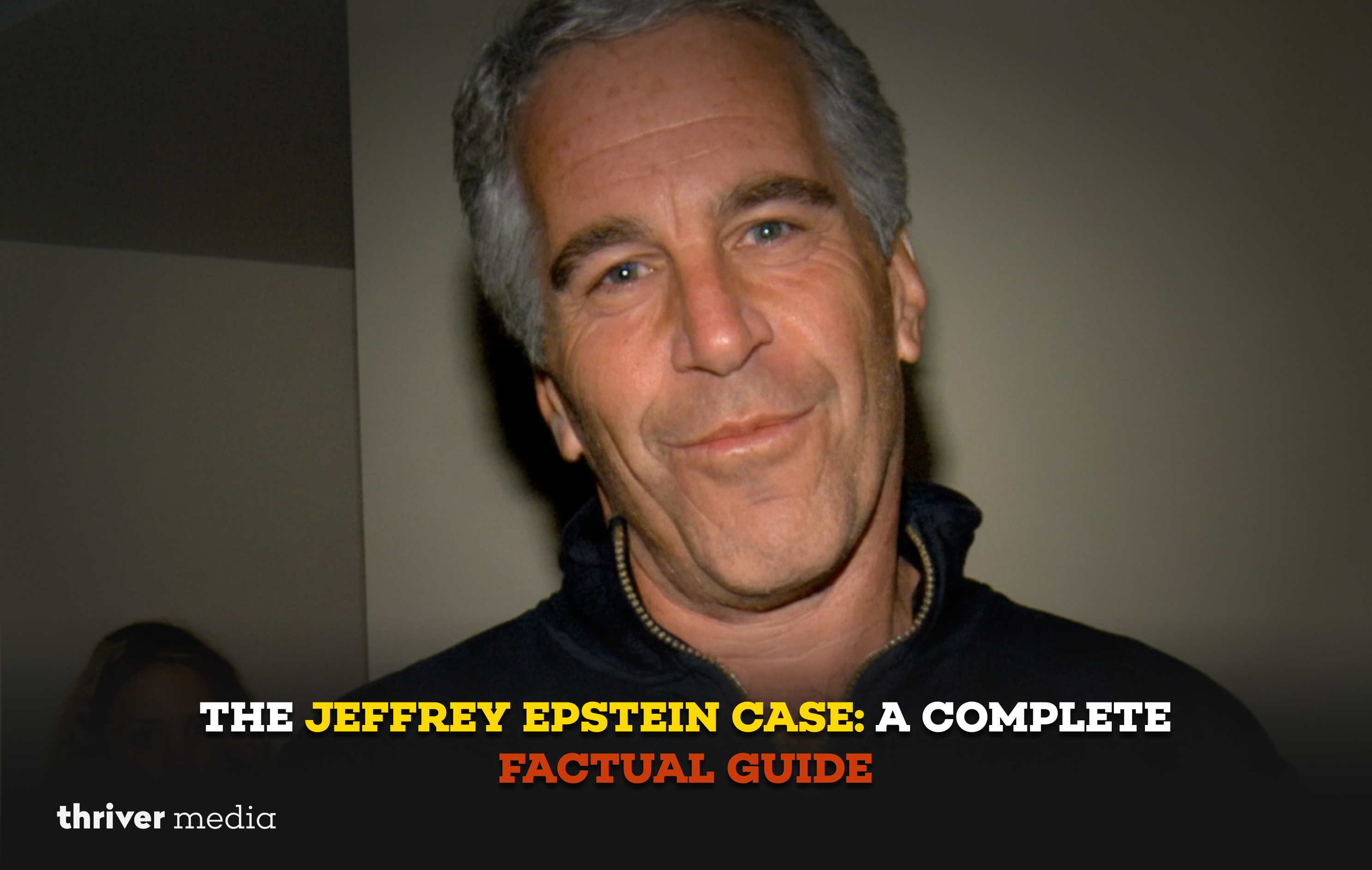 Man with gray hair wearing a dark zip-up jacket, photographed indoors during a public appearance connected to a high-profile legal case.