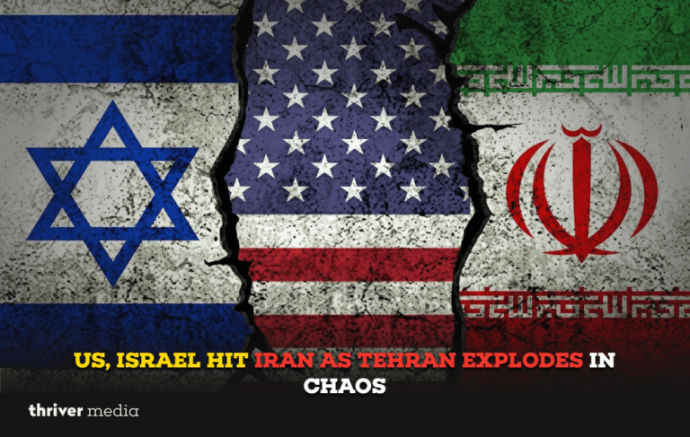 Cracked wall graphic showing Israel, US, and Iran flags divided by fracture line with headline “US, Israel Hit Iran as Tehran Explodes in Chaos.”