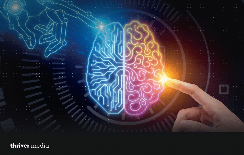 Illustration of a half-human, half-digital brain glowing with circuits as a robotic hand and human finger interact, symbolizing the connection between artificial intelligence and human cognition.